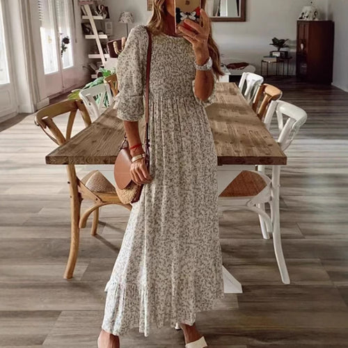 Damen Kleid mit floralen Akzenten und luftigen Puffärmeln Heidi-Mode
