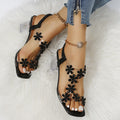 Damen modische Sandalen mit transparentem Riemen und Blumenapplikationen R&B