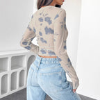 Damen nan figurbetontes tailliertes bauchfreies Mesh-Oberteil mit Rundhals, verlängerten Ärmeln, Daumenlöchern und dezentem Batikmuster R&B