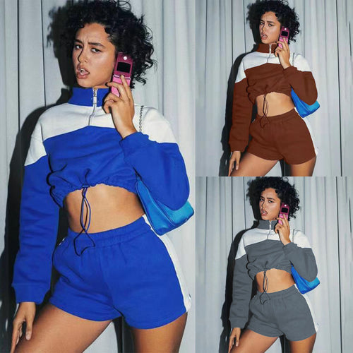Damen modernes Sportoberteil mit kurzem Schnitt und dazu passender Shorts R&B