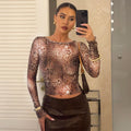 Damen Langärmliges Leopardenoberteil mit figurbetontem Schnitt und Besonderheiten R&B