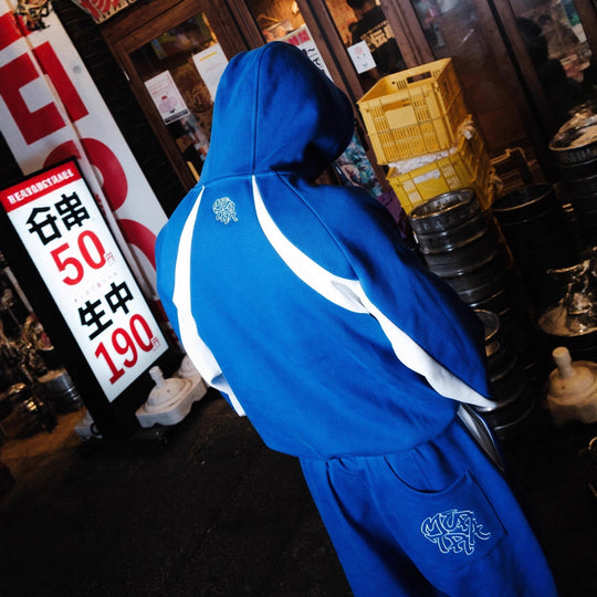 Damen nan verkürzte Joggerhose mit elastischem Komfortbund, seitlichen Kontrast-Taschen und verstellbarer Saumkordel R&B