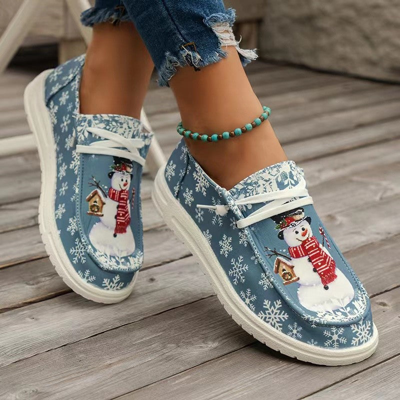 Damen Sneakers im winterlichen Design mit Schneemann-Motiv und rutschfester Sohle R&B