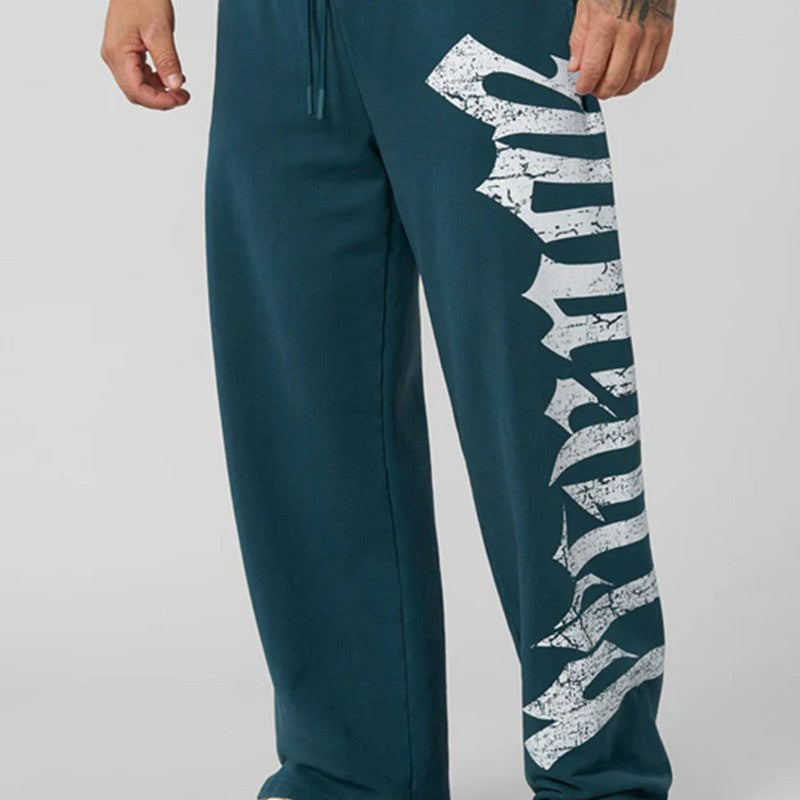 Herren nan weite Sweathose aus angerautem Fleece mit seitlichem Vintage-Print und Kordelbund R&B