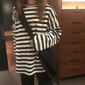 Damen gestreiftes Langarmshirt mit weitem Schnitt und modernen Details