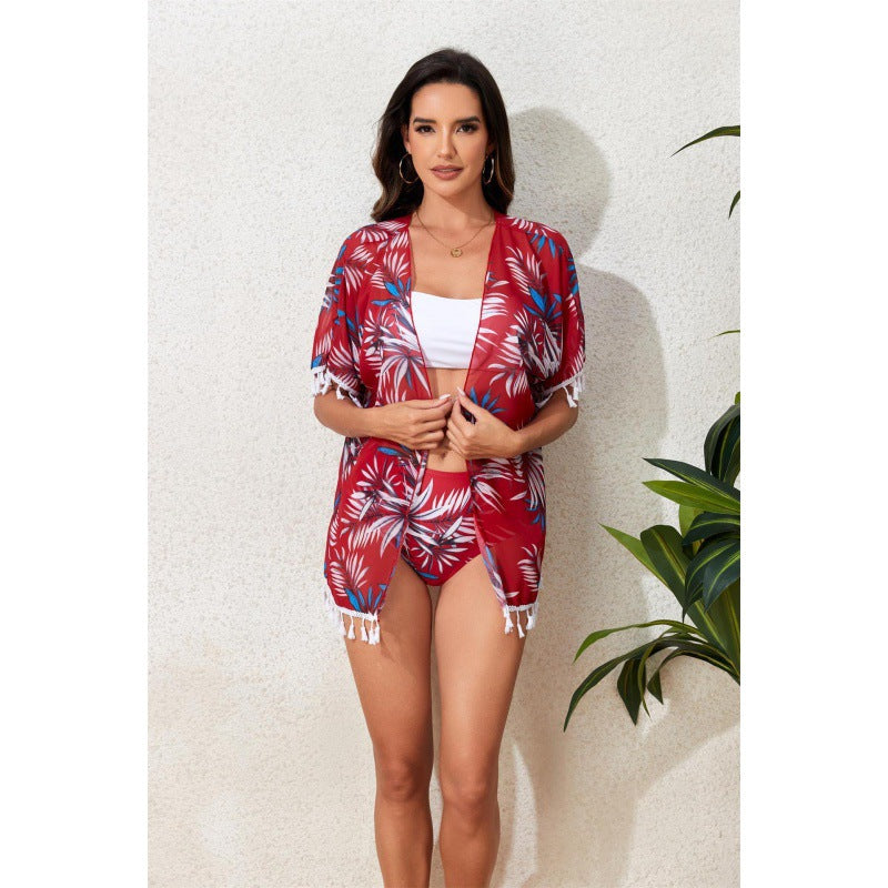 Damen Strandkleid mit floralem Design und fransenverziertem Überwurf R&B