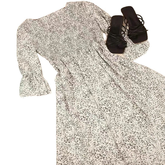 Damen Kleid mit floralen Akzenten und luftigen Puffärmeln Heidi-Mode