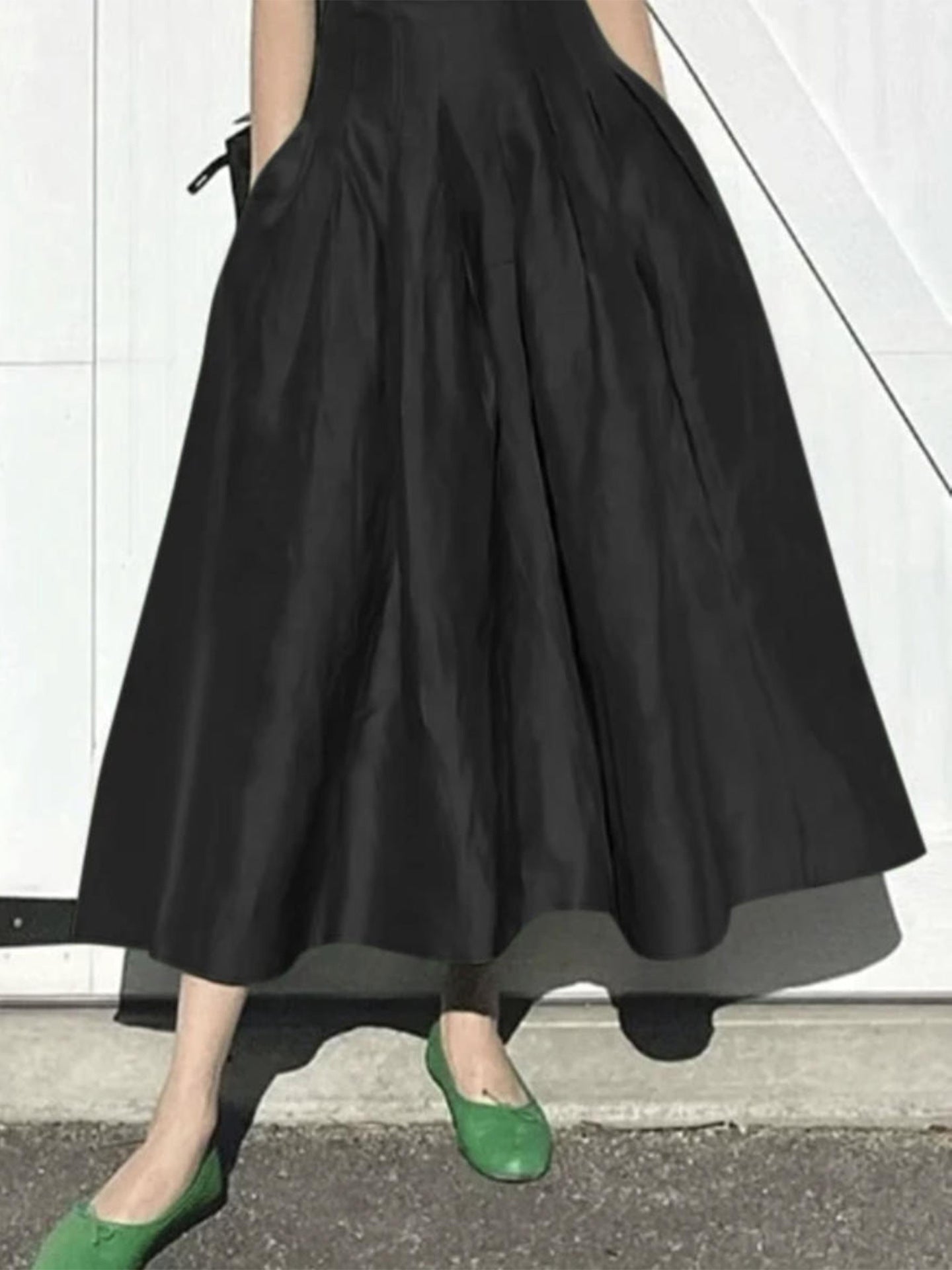 Damen Eleganter Midirock mit fließendem Schnitt und seitlichen Taschen EB