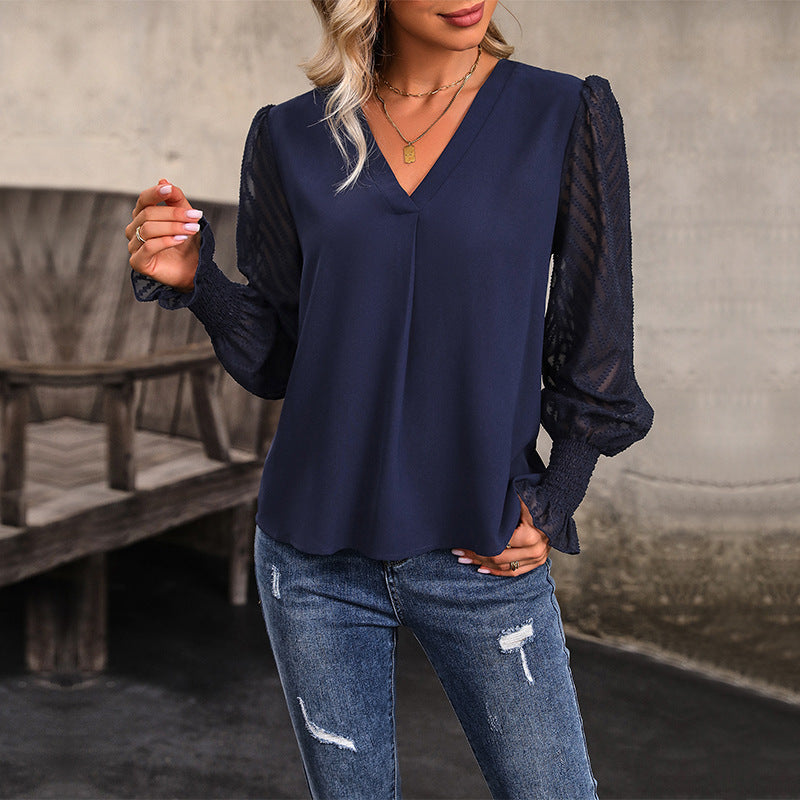 Damen Bluse mit transparenten Puffärmeln und V-Ausschnitt