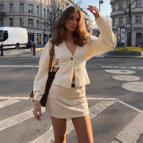 Damen modische Strickjacke mit knöpfbarem Design und weiten Ärmeln R&B