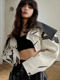 Damen Modische Cropped Jacke mit geometrischem Design und Kunstlederdetails R&B