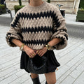 Damen Grobstrickpullover mit geometrischem Muster und voluminösen Ärmeln