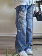 Damen Weit geschnittene Jeans mit einzigartigem Design und prominentem Druck R&B
