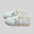 Damen Freizeit Sneakers mit leichtem Punktemuster und verspielten Schleifen