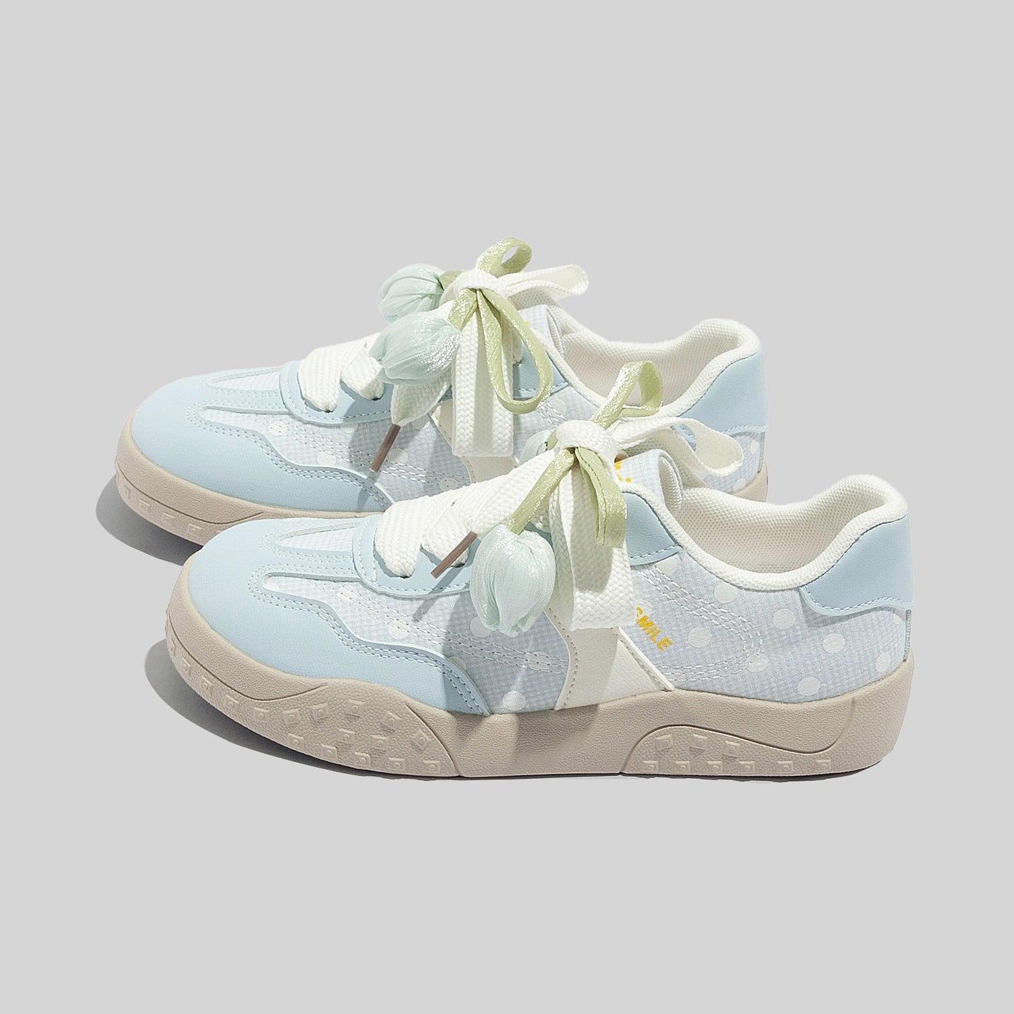 Damen Freizeit Sneakers mit leichtem Punktemuster und verspielten Schleifen
