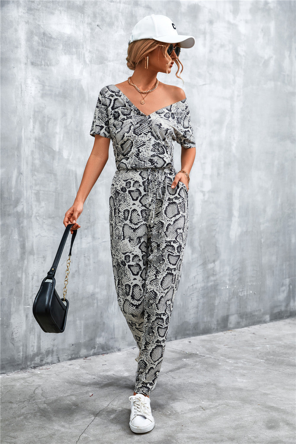 Damen elegante Jumpsuit im Snake-Print-Stil mit Taillengürtel und V-Ausschnitt R&B