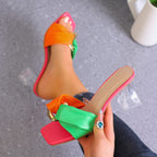 Damen Elegante Mules mit modischer Schleifen-Applikation und transparentem Blockabsatz