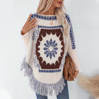 Damen eleganter Strickponcho mit kunstvollem Muster und fransigem Abschluss