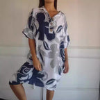 Damen luftiges Strandkleid mit modischem Muster und seitlichen Taschen