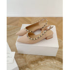Damen Slingback Pumps mit schimmerndem Lack und eleganter Nietenverzierung