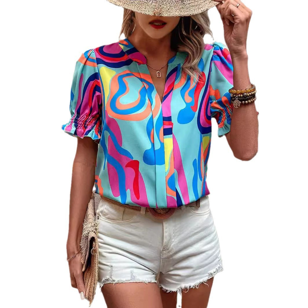 Damen Bluse mit kessen Puffärmeln und kreativem Grafikdesign R&B