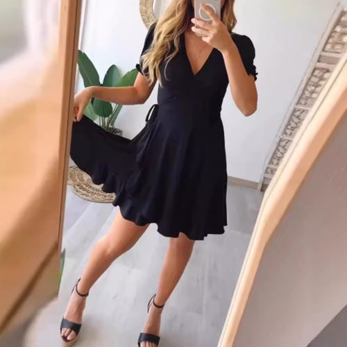 Damen Wickelkleid mit voluminösen Ärmeln und frischem Saum Heidi-Mode