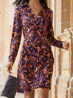 Damen Blusenkleid mit kunstvollem Muster und figurbetontem Schnitt
