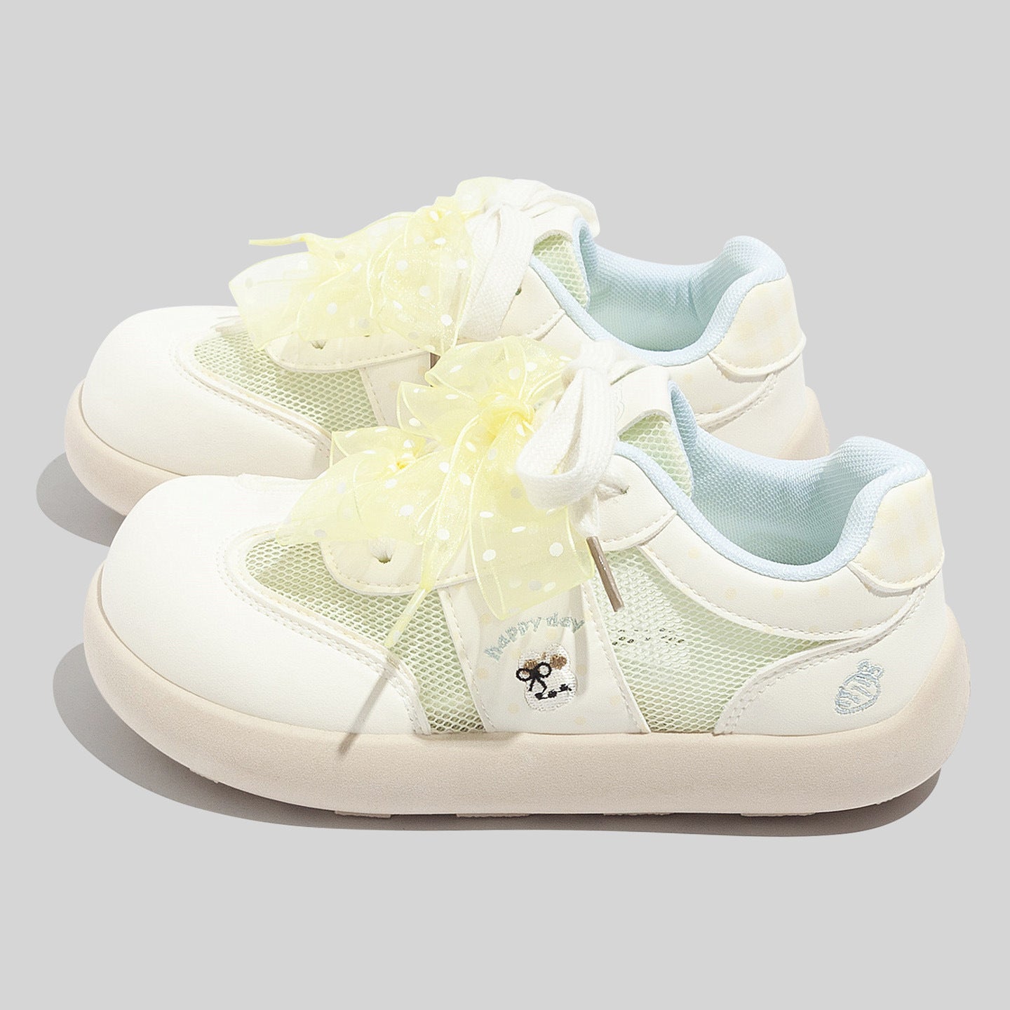Damen Sneakers mit verspieltem Bogen-Design und atmungsaktiven Netzpanelen