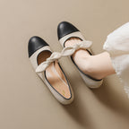 Damen elegante Ballerinas mit dekorativem Schleifenakzent und klassischem Farbblockdesign