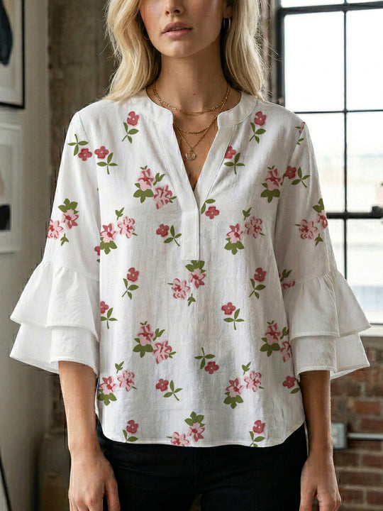 Damen Bluse mit voluminösen Rüschenärmeln und modernem Motiv R&B