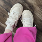 Damen Sneakers mit glitzernden Applikationen und hochgezogenem Plateau