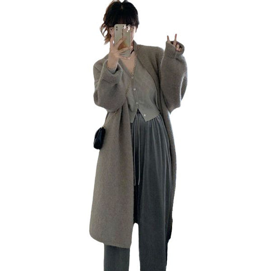 Damen Gemütliche Strickjacke mit oversized Schnitt und sanften Puffärmeln R&B