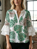 Damen Bluse mit voluminösen Flügelärmel und intensivem Blattmuster