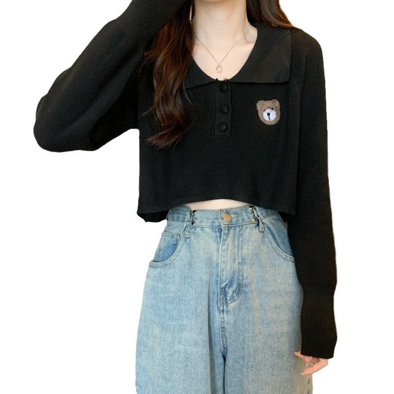 Damen Cropped Pullover mit einem Knopfverschluss und Einhorn-Emblem
