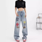 Damen Weite Destroyed Jeans mit bunter Akzentuierung und modischen Rissen R&B