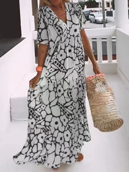 Damen Fließendes Maxikleid mit V-Ausschnitt und floralem Design R&B