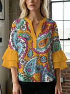 Damen Bluse mit voluminösen Flügelärmel und intensivem Blattmuster