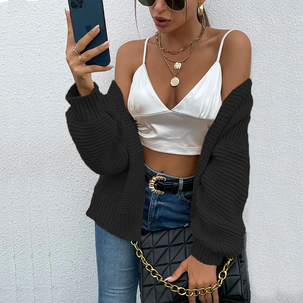 Damen Strickjacke mit voluminösen Ärmel und stylischem Rippenmuster R&B