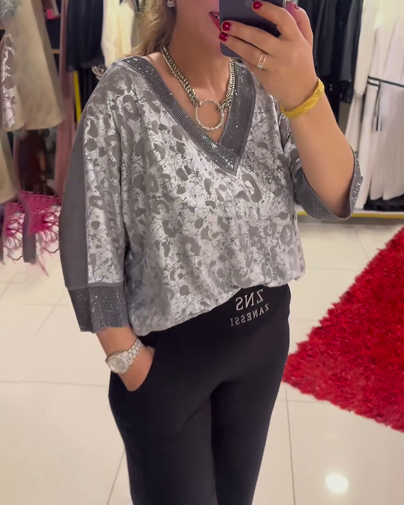 Damen Elegante Bluse mit schimmernden Akzenten und V-Ausschnitt Heidi-Mode