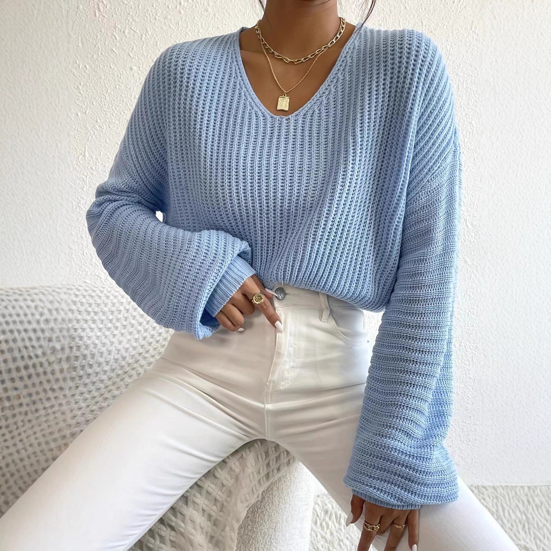 Damen lässiger Strickpullover mit weitem V-Ausschnitt und extra langen Ärmeln