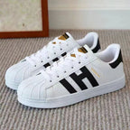 Damen Sportliche Freizeit Sneakers mit Lederoberfläche und rutschfester Sohle R&B