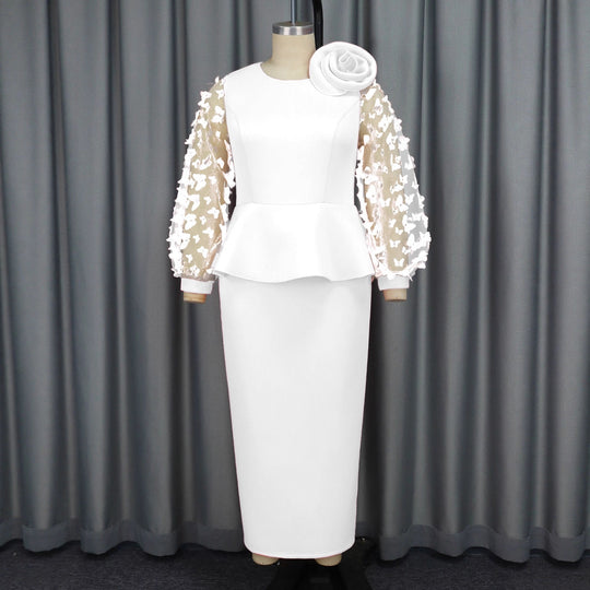Damen Elegantes Kleid mit extravaganten Puffärmeln und floralem Detail R&B