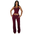 Damen Modischer Jumpsuit mit dekorativem Halterkragen und Gürteldetails R&B