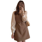 Damen Kleid mit stylischen Puffärmeln und eleganter Taillierung
