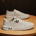 Damen Sneakers mit eleganter Logoprägung und dämpfender Laufsohle