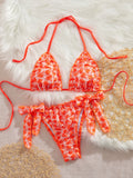 Damen Triangel-Bikini mit verspielten BindR&Bändern und floralem Design R&B