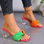 Damen Elegante Mules mit modischer Schleifen-Applikation und transparentem Blockabsatz