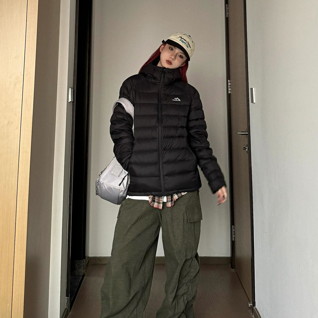 Damen gesteppte Winterjacke mit hohem Kragen und praktischen Seitentaschen