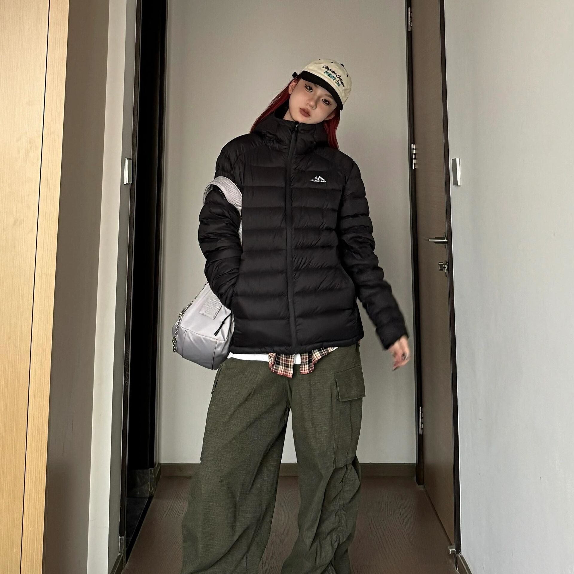 Damen gesteppte Winterjacke mit hohem Kragen und praktischen Seitentaschen