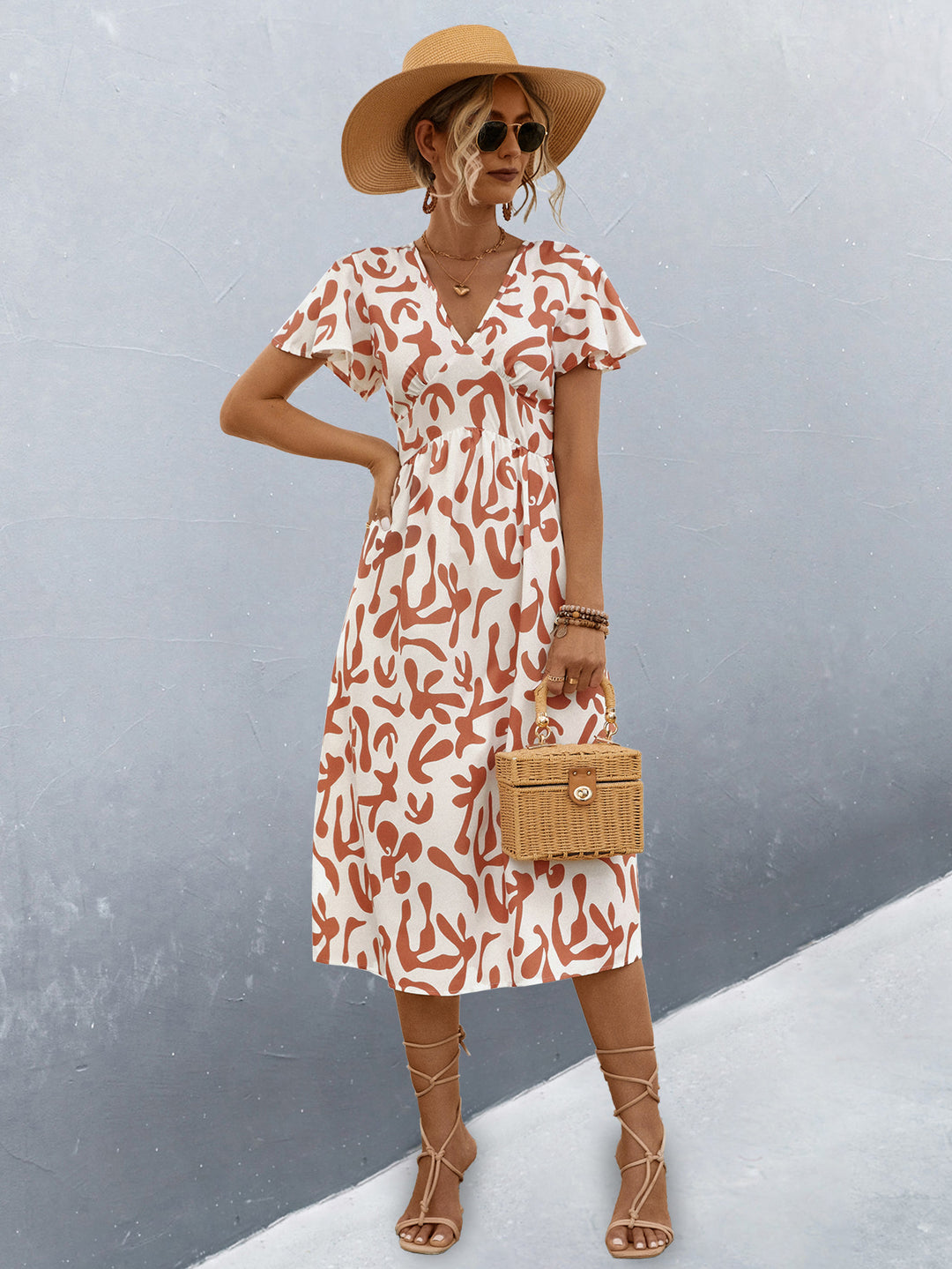 Damen Wickelkleid mit floralem Muster und eleganter Raffung R&B